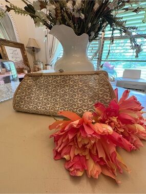 Ornate Swirl Textured Clutch in Champagne